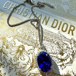 Purple stone necklace from Saks. Costume